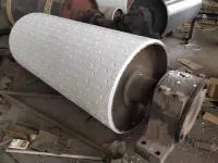 Керамическая футеровка металлических барабанов конвейера